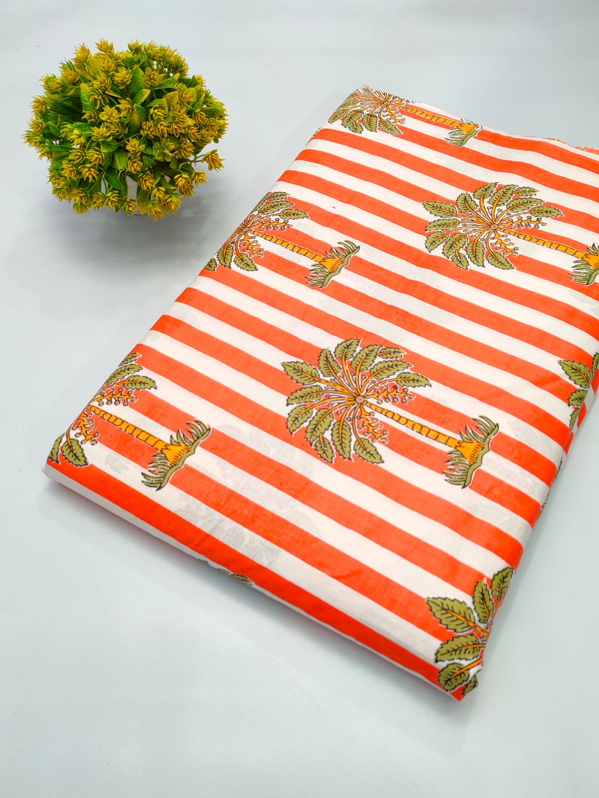 Close-up of Orange Striped Floral Screen Print Pure Cotton fabric from Tulsi Prints