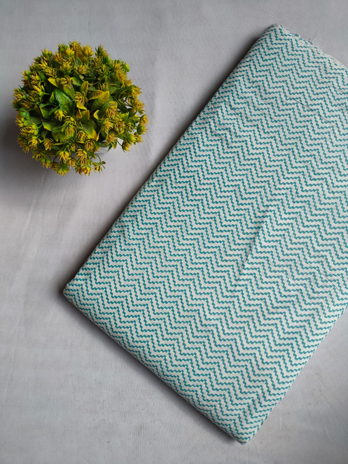 White And Teal Blue Zigzag Screen Print Pure Cotton Fabric From Tulsi Prints