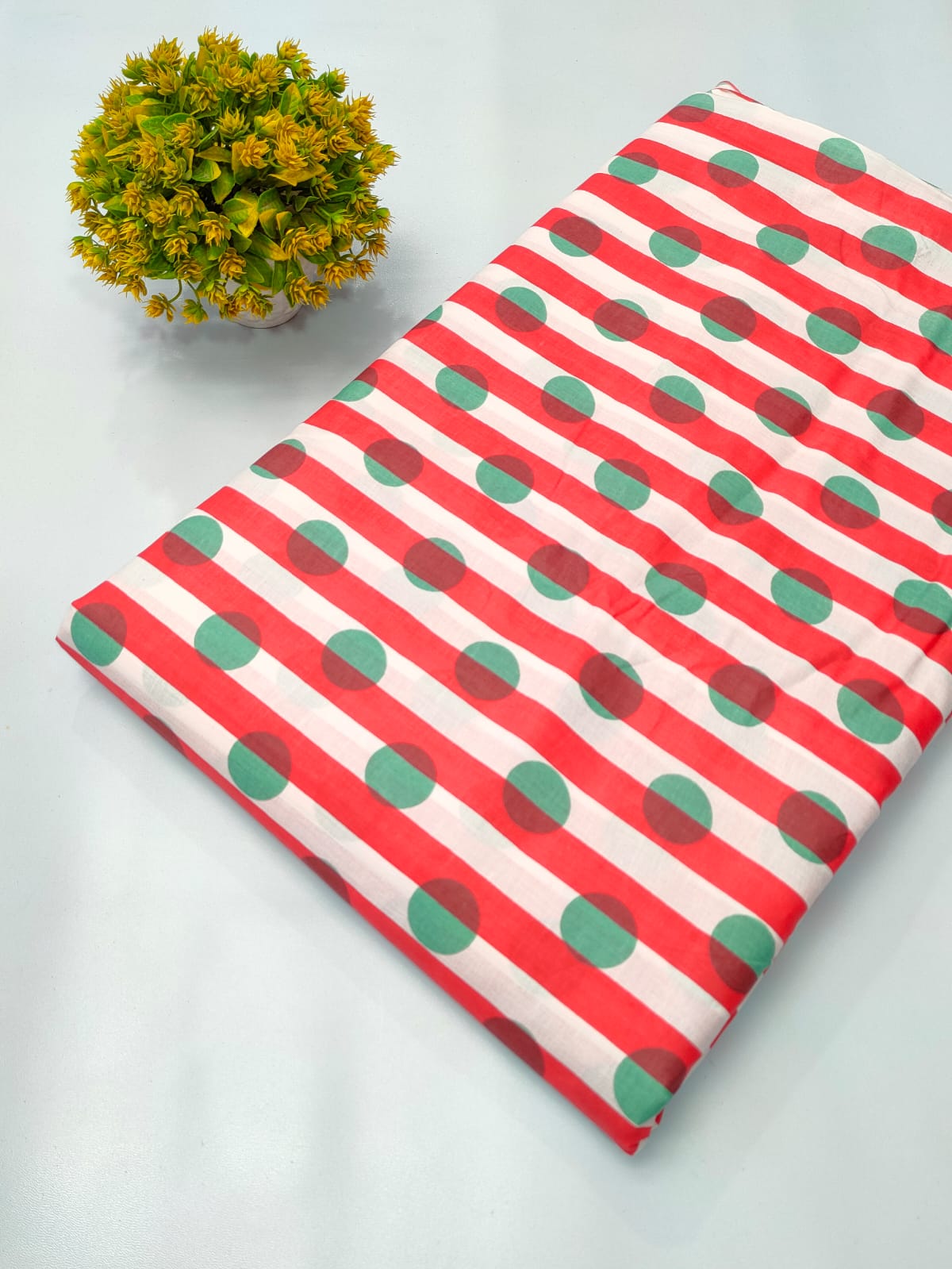 Close-up of Red Polka Dot Screen Print Pure Cotton Fabric from Tulsi Prints