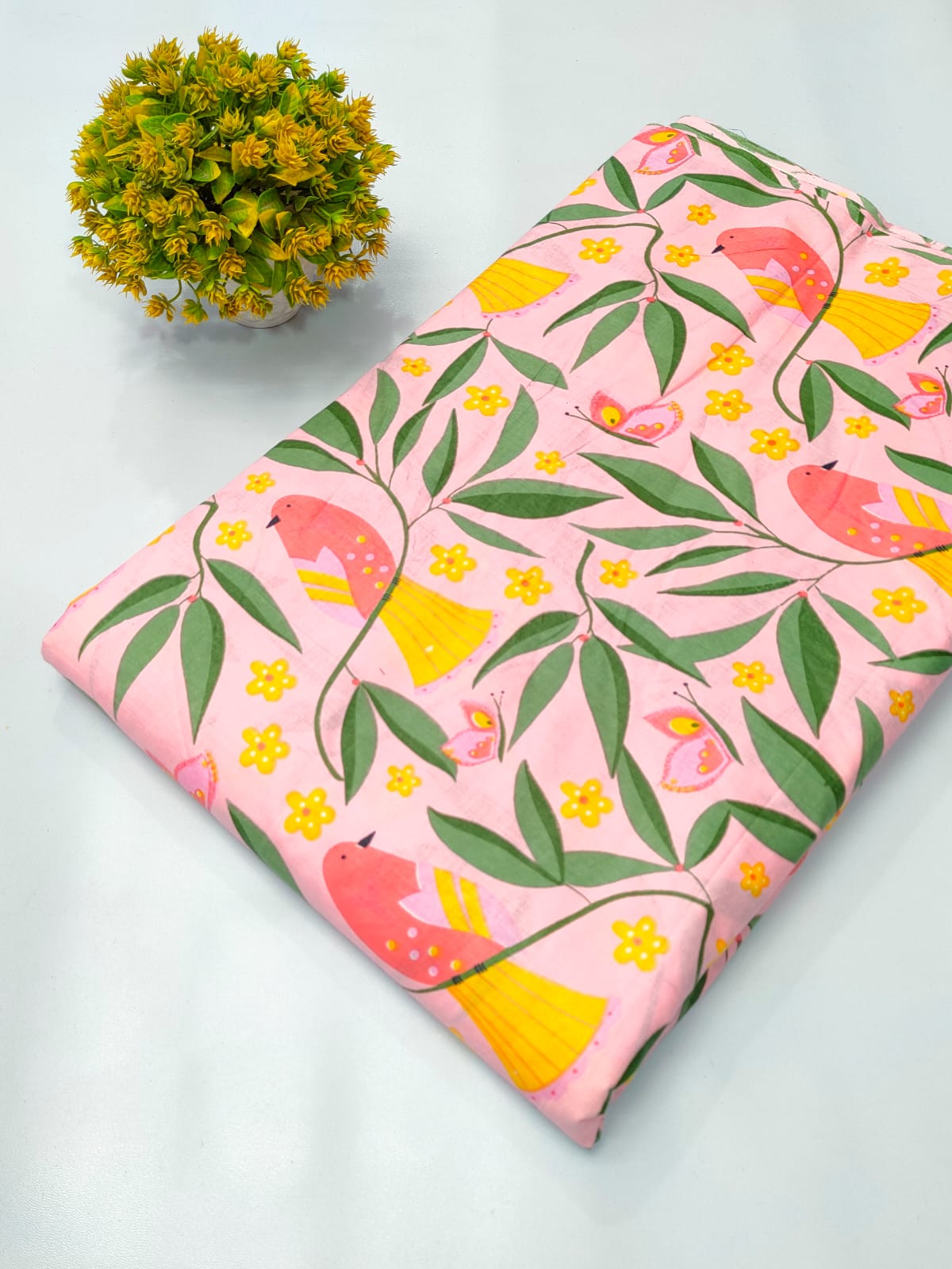 Close-up of Pink Bird Floral Screen Print Pure Cotton Fabric from Tulsi Prints