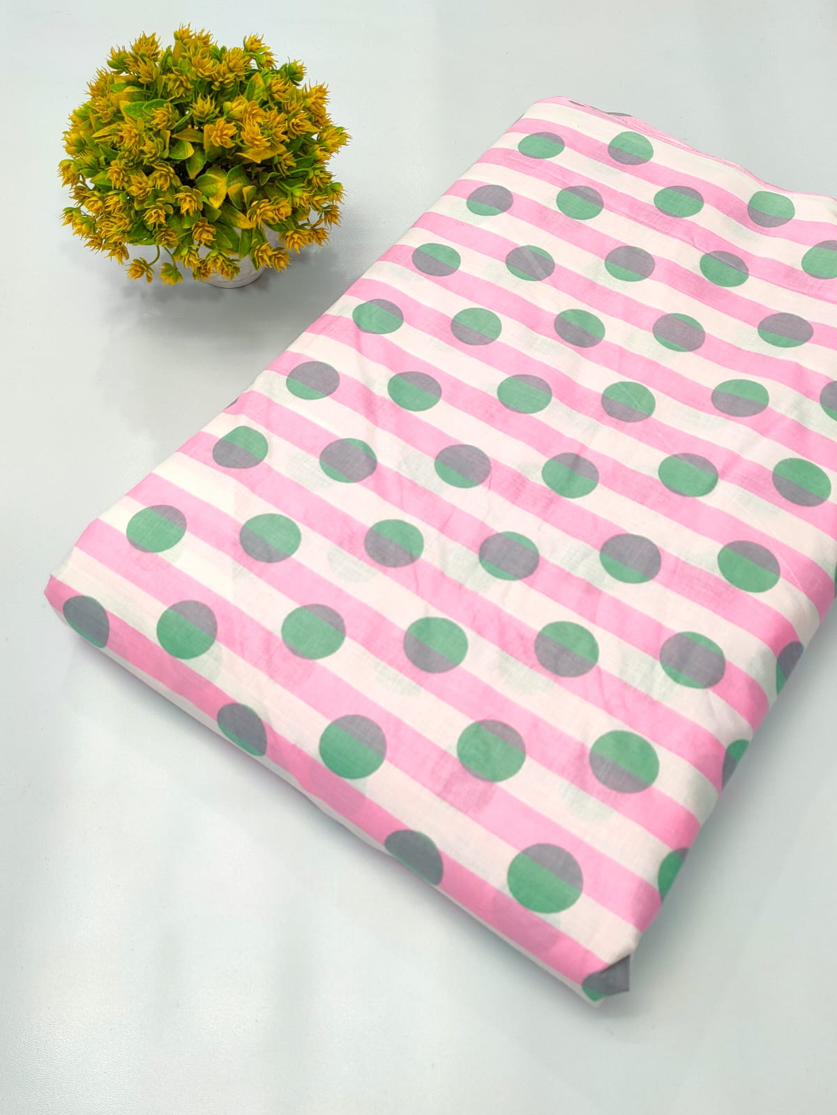 Close-up of Pink Polka Dot Screen Print Pure Cotton Fabric from Tulsi Prints