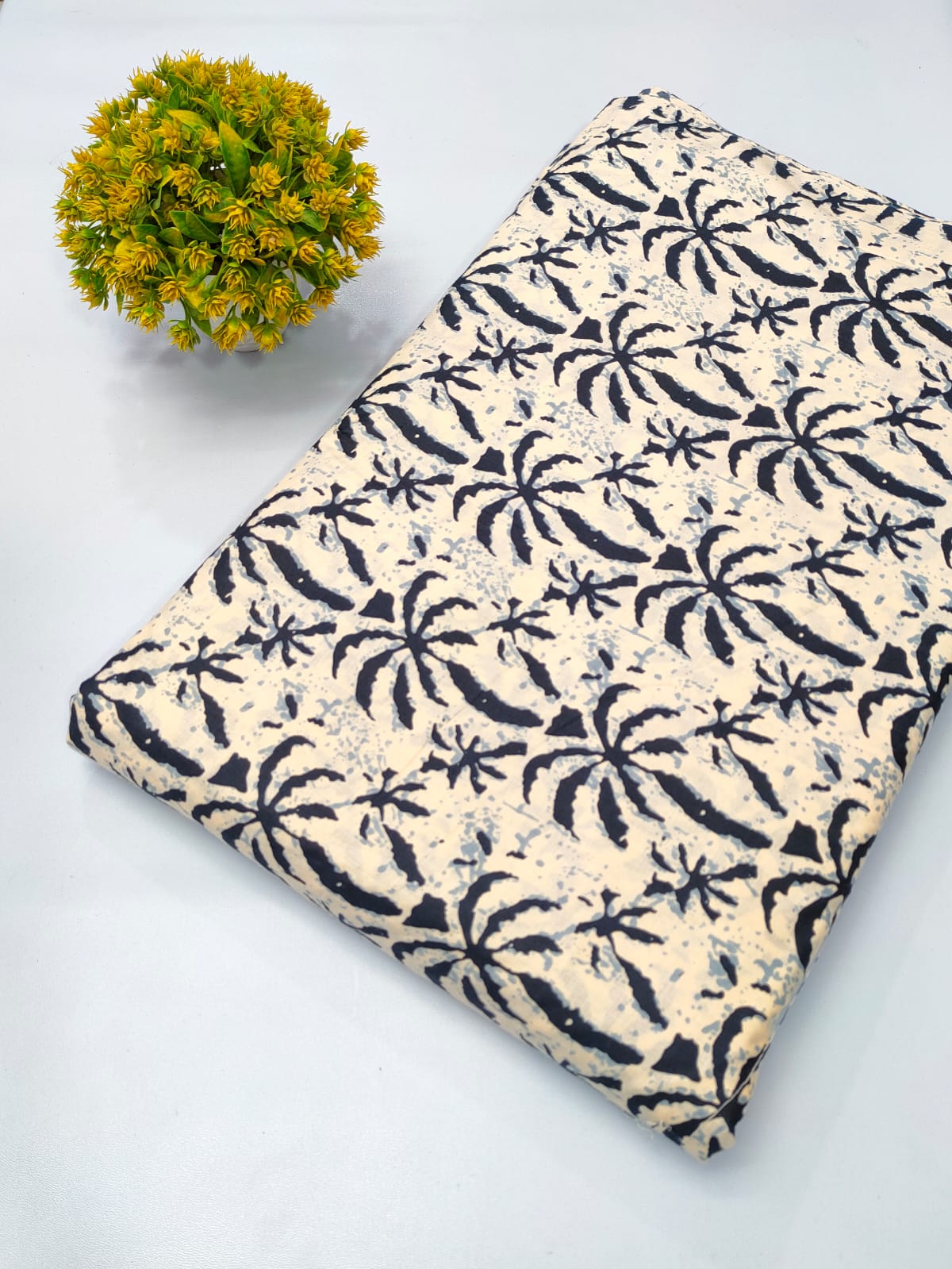 Close-up of Cream Floral Screen Print Pure Cotton Fabric from Tulsi Prints