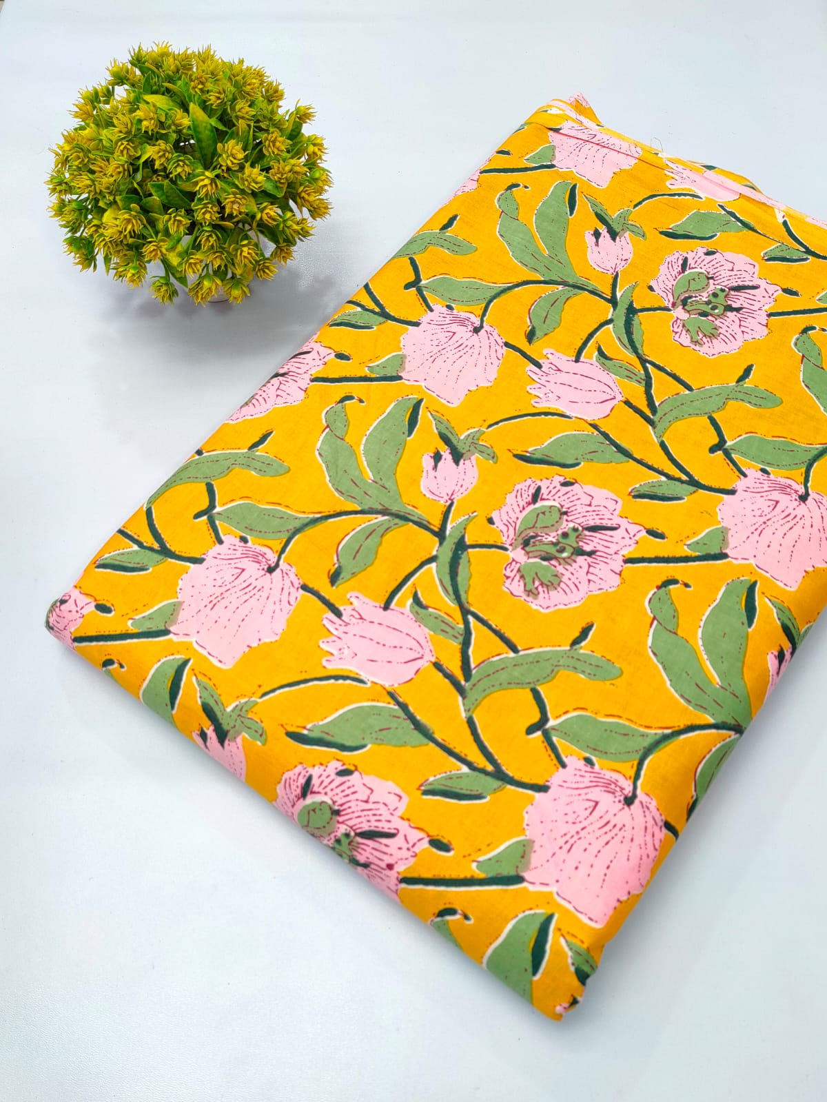 Close-up of Mustard Floral Screen Print Pure Cotton Fabric from Tulsi Prints