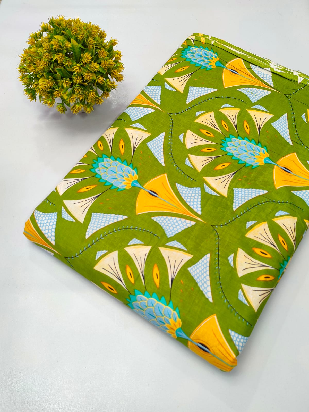 Close-up of Green Floral Screen Print Pure Cotton Fabric from Tulsi Prints
