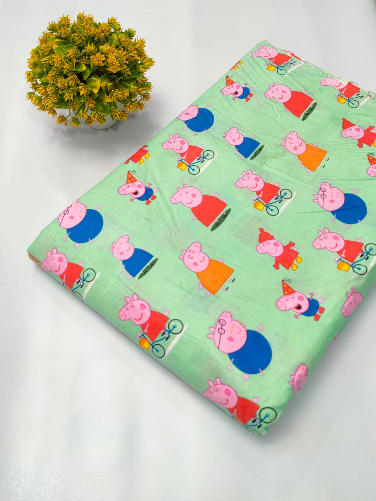 Green Character Print Screen Print Pure Cotton Fabric From Tulsi Prints