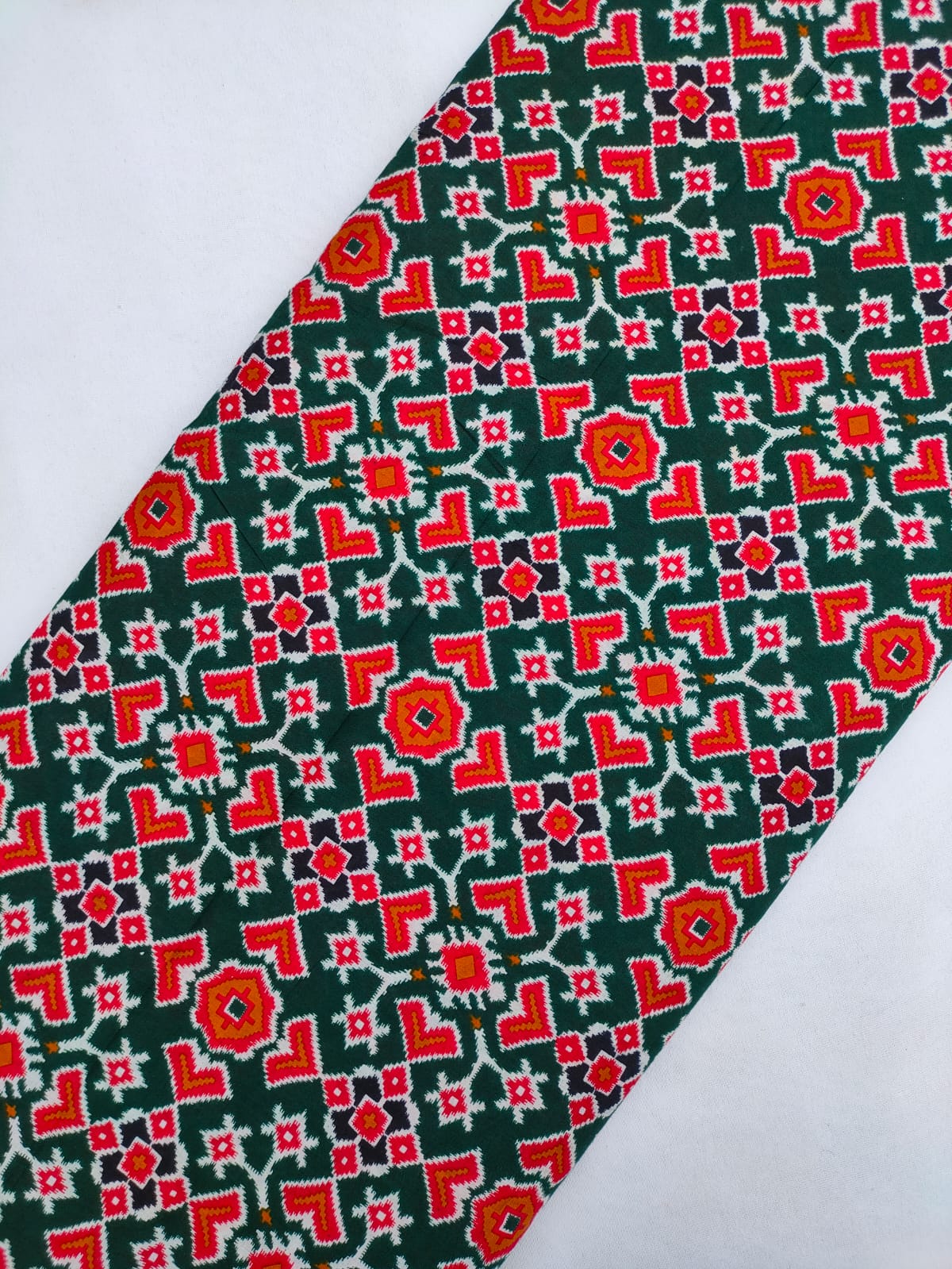 Dark Green Geometric Ikat Screen Print Pure Cotton Fabric From Tulsi Prints