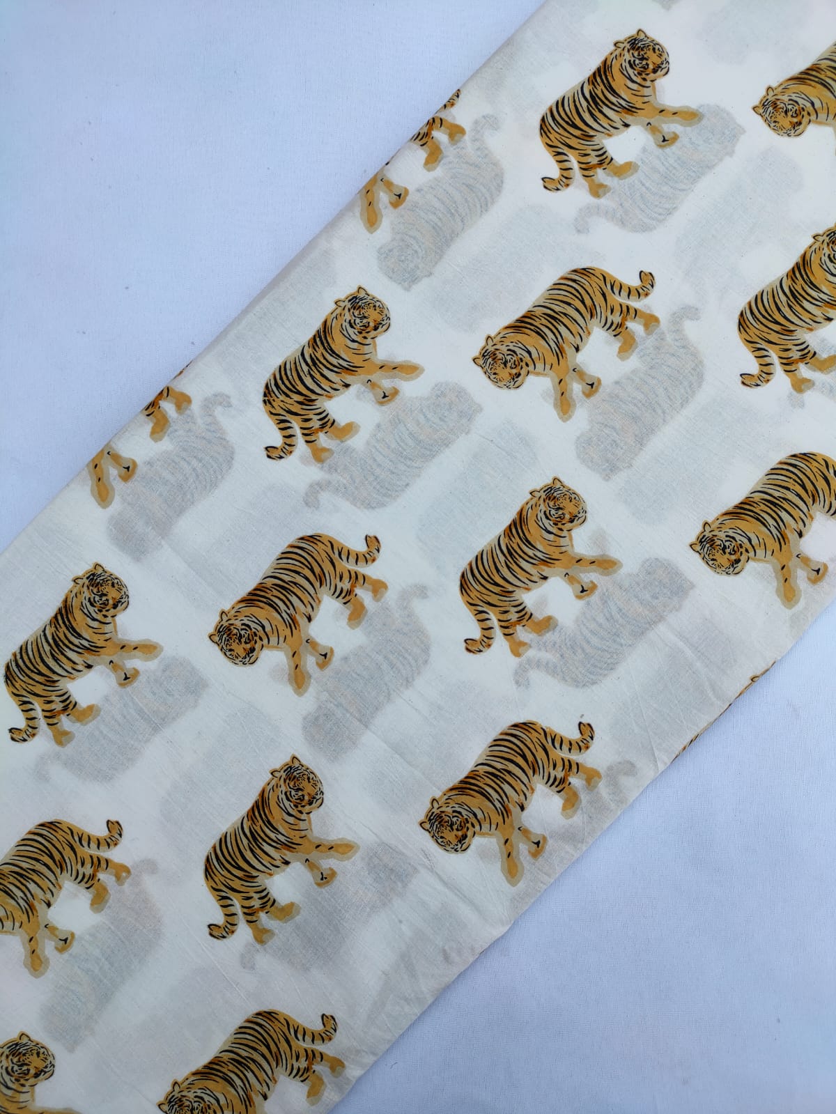 Cream Tiger Motif Screen Print Pure Cotton Fabric From Tulsi Prints