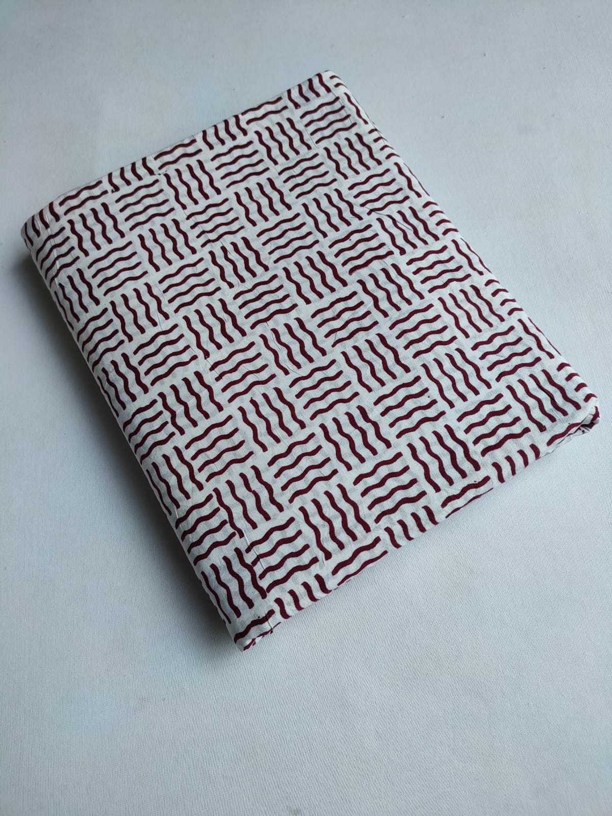 Off White and Maroon Wavy Geometric Block Print Pure Cotton Fabric From Tulsi Prints