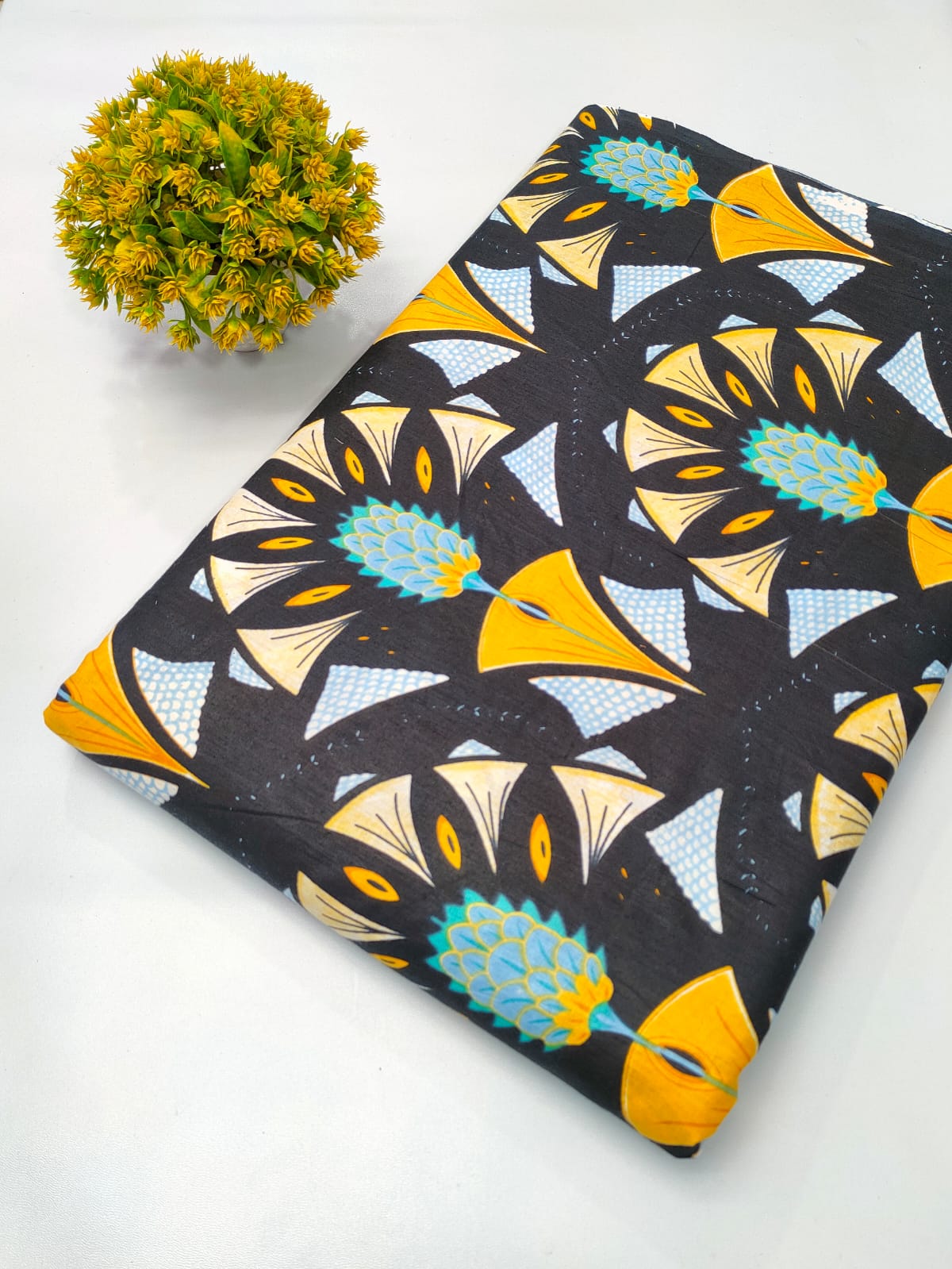 Close-up of Black Floral Screen Print Pure Cotton Fabric from Tulsi Prints